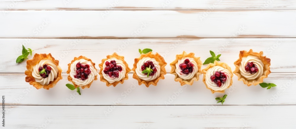 Aufkleber a festive assortment of phyllo pastry appetizers featuring cranberries and baked brie arranged on a 