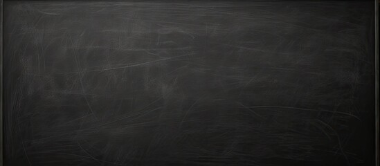 A blackboard with chalk marks erased leaving empty space for new information commonly known as copy space image
