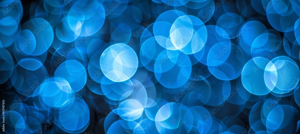 Poster captivating abstract blue light bokeh creating a beautifully blurred background effect