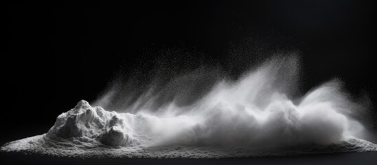 A black background hosts a striking image of white chalk powder providing copy space for textures or messages - Powered by Adobe