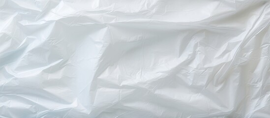 A copy space image with an abstract background pattern texture made from plastic bags emphasizing the concept of avoiding plastic bags to save the world and protect the earth