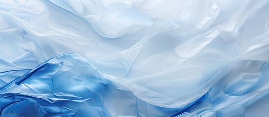 Fototapeta premium A copy space image with an abstract background pattern texture made from plastic bags emphasizing the concept of avoiding plastic bags to save the world and protect the earth