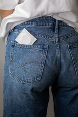 Condoms in jeans pocket. Prevent infection. World AIDS Day. The concept of sexual health.