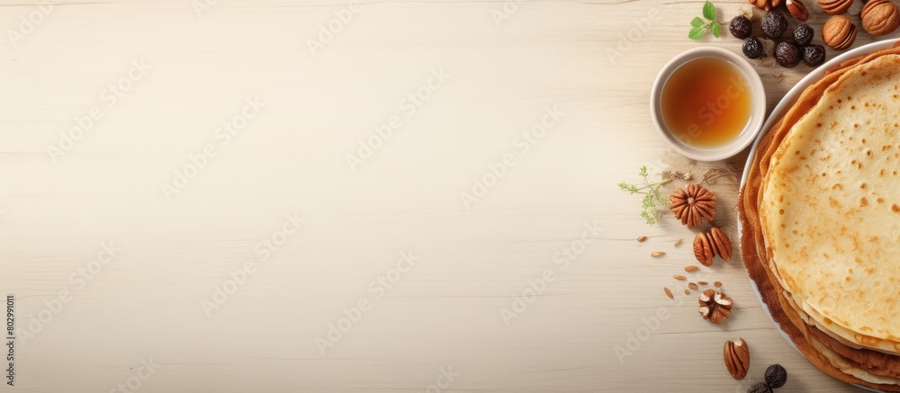 Aufkleber A copy space image of crepes honey and nuts on a white plate placed on a wooden background