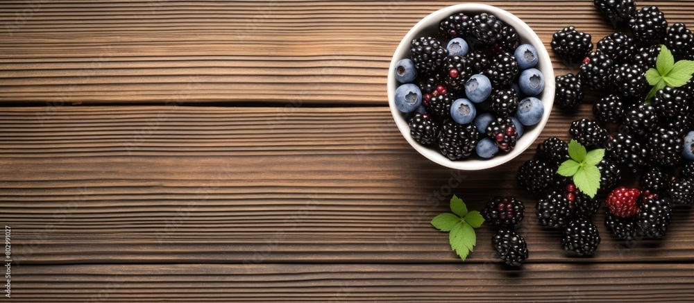 Poster a breakfast bowl of yogurt oatmeal blueberries blackberries and chia seeds is beautifully displayed 