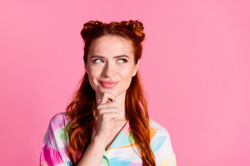 Photo of smart girl with red tails dressed colorful blouse thoughtfully look at sale empty space isolated on pink color background