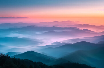 Obraz premium As the sun dips below the horizon, the rugged peaks of the mountain range cast long shadows, creating a dramatic silhouette against the colorful sky. The orange and pink hues of the sunset.