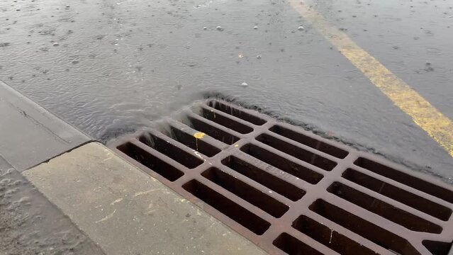 Excess rainfall runs into the inlets of the storm drainage system during rain. Stormwater management concept