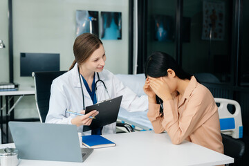 Psychology, depression. Suffering woman, consulting with psychologist, psychiatrist while patient...