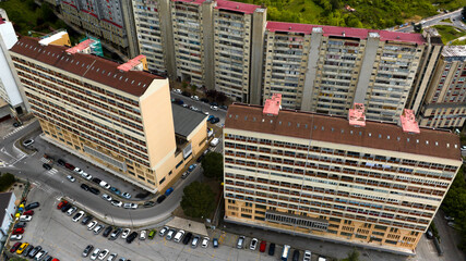 Aerial view of tenement house on the outskirts of a city in Italy. Italian public housing concept.