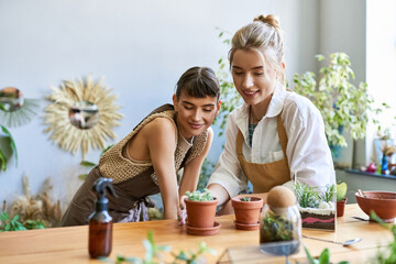 Two women enjoy the beauty of botanicals.