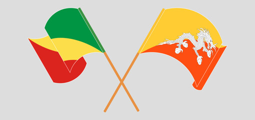 Crossed and waving flags of Republic of the Congo and Bhutan