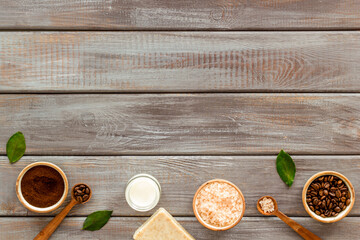 Flat lay of organic spa care cosmetic with coffee soap and scrub