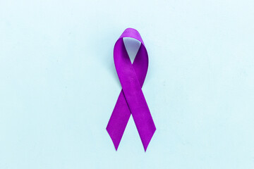 Purple ribbon - pancreas cancer awareness and Alzheimer's disease concept