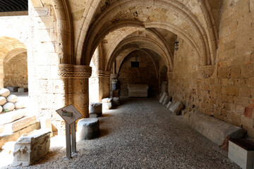 Rhodes, Greece - August 10, 2017: Archaeological museum, arches, stone building, medieval old european architecture