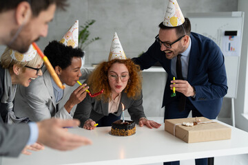 Corporate people celebrate birthday at office