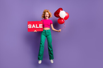 Photo of excited surprised woman wear trendy pink clothes celebrate special news sale isolated on purple color background