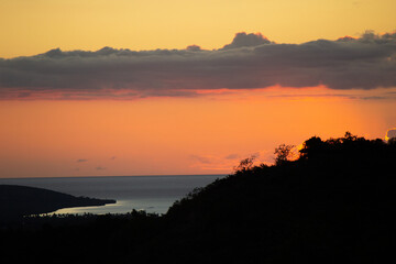 ocean sunset in the mountains 