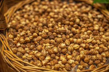 Assorted Dried Spices in Large Wicker Baskets at a Market