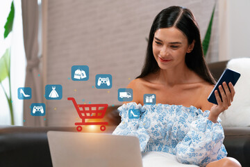 Elegant customer wearing blue dress controlling device choosing online platform. Smart consumer...