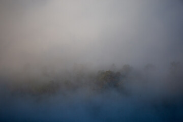 High-angle landscape mountains fog There is space for text.