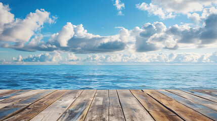 Empty wooden surface against blue sea and sky