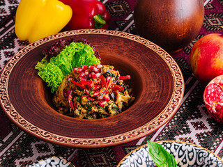 Traditional ethnic cuisine on ornate tablecloth