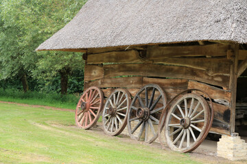 Obraz premium ancient barn with wooden wheels in Bokrijk, Genk, Belgium