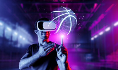Caucasian sport person playing basketball at neon sport stadium while wearing casual cloth and virtual reality glasses. Athlete holding basketball hologram while standing at sport arena. Deviation.