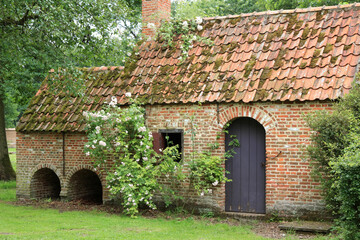 small ancient brick farmhouse in Bokrijk, Genk, Belgium