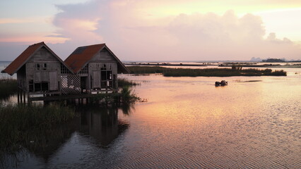 Fototapeta premium The sun sets at a certain place. Under the peace and beauty