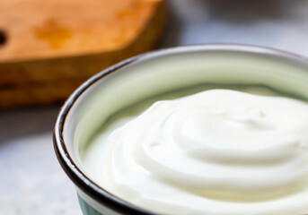 Homemade yogurt or sour cream in bowl