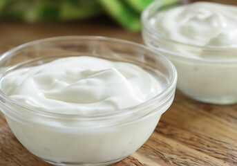 Obraz na płótnie Canvas Homemade yogurt or sour cream in bowl