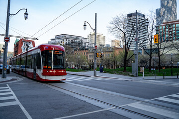Fototapeta premium Streetcar in Toronto Downtown. Toronto, Canada - April 29, 2024.