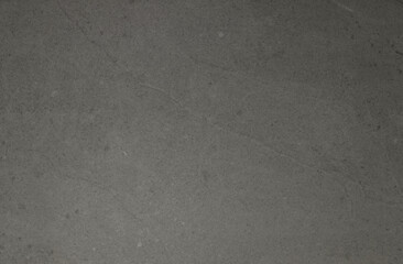 black background with gray concrete wall