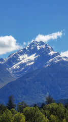 Snowy mountain with trees under cumulus clouds in the natural landscape. Generative AI