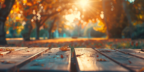 autumn table with yellow leaves wooden plank sunset forest Empty wooden table with autumn blurred...