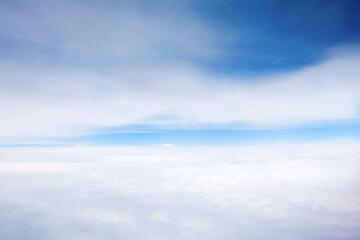  Nature view large soft white clouds on soft blue sky background with sunlight in morning, Panorama view of white cloudy on the plane.