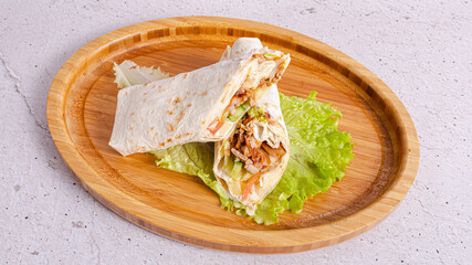 Durum kebab sliced on tray