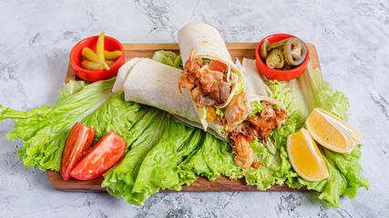 Durum kebab sliced on tray