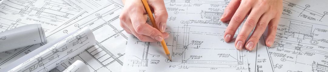 Architects concept, engineer architect designer freelance work on start-up project drawing,...