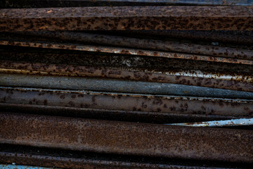 close up of a stack of metal pipes