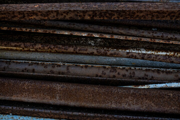 close up of a stack of metal pipes