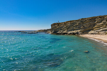 Fototapeta premium sandstone rocks and pebble cove beach of Delikli Koy near Alacati (Izmir province, Turkiye) 