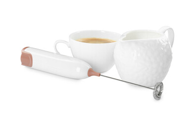 Mini mixer (milk frother), cup of coffee and pitcher isolated on white