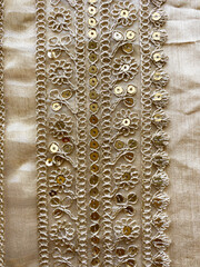 Intricate golden thread with tikki embroidered floral border