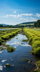 Obraz premium A beautiful landscape with a river running through the middle