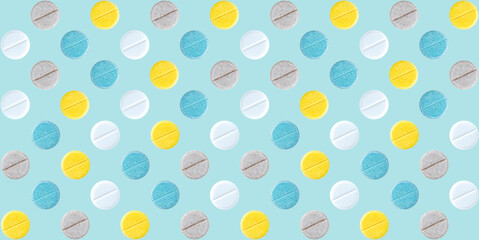 Seamless repetitive colorful round pills arrangement on soft blue background. Medical and health care concept.