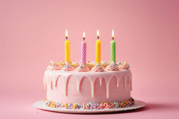 birthday cake with 4 four candles on pastel pink background