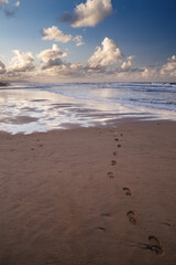 Footprints of a person on Denia beach